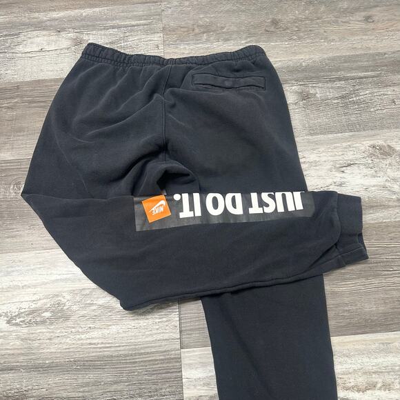 Nike NSW Just Do It JDI Black Mens Medium Spellout Tapered Leg Jogger Sweatpants - Picture 1 of 11
